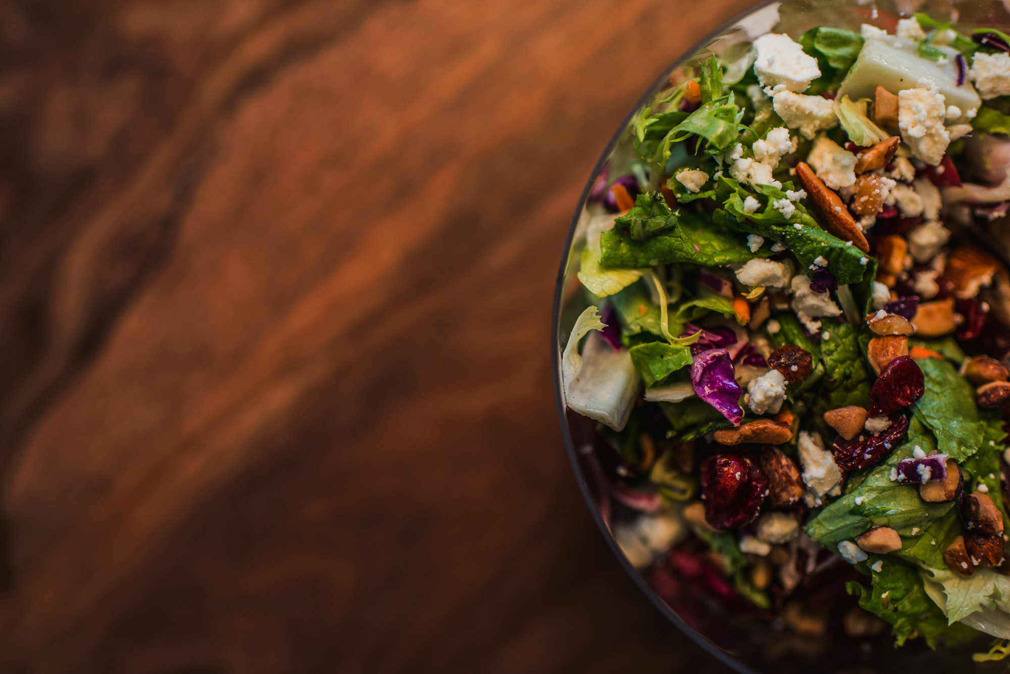 a salad on a wooden table